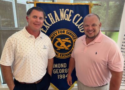 Matt Campbell poses with outgoing president Matt Hodges.